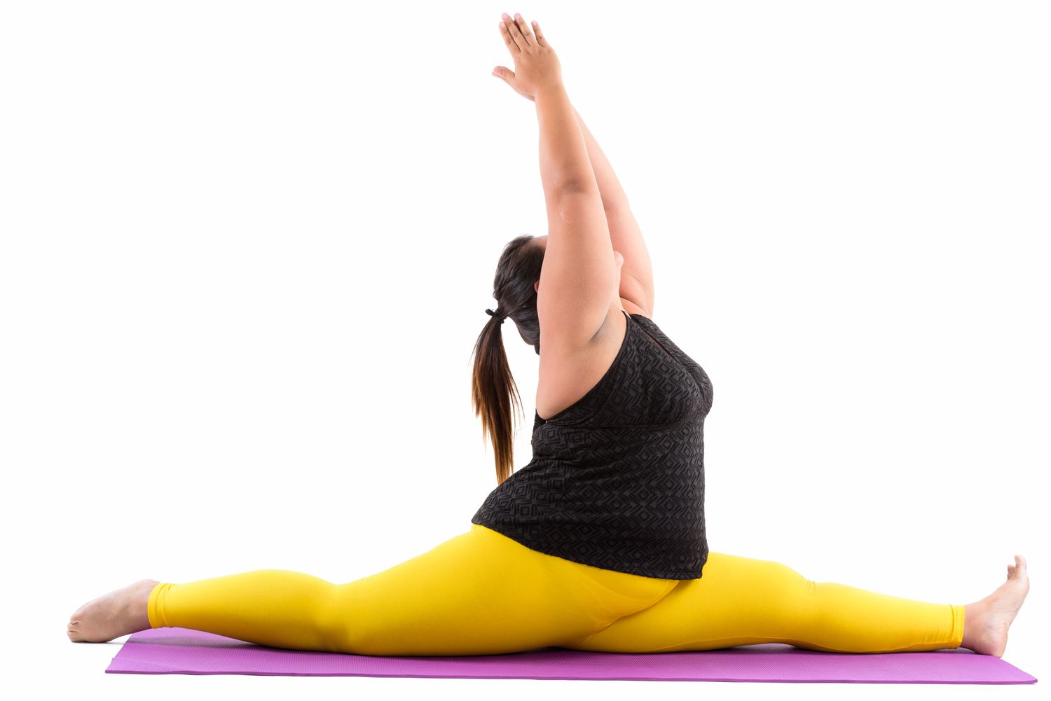 Bigger-bodied woman doing a yoga pose on a mat