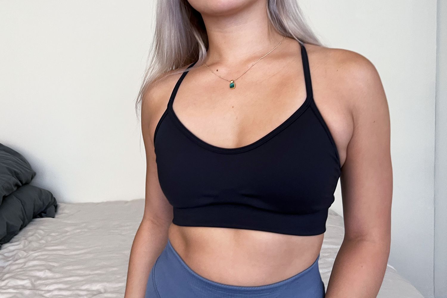 A person wearing the Gymshark Sweat Seamless Bra