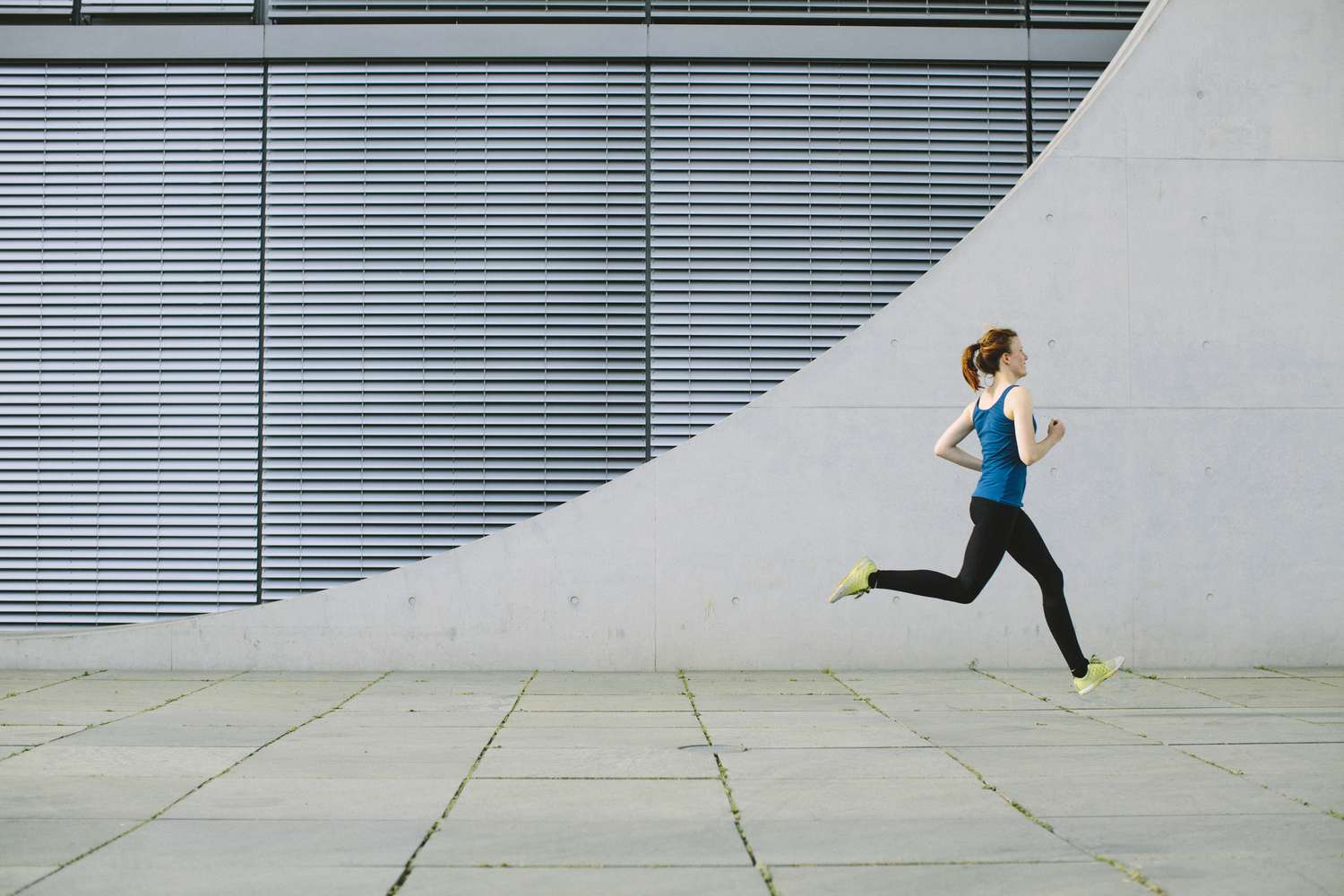 Woman running in urban setting