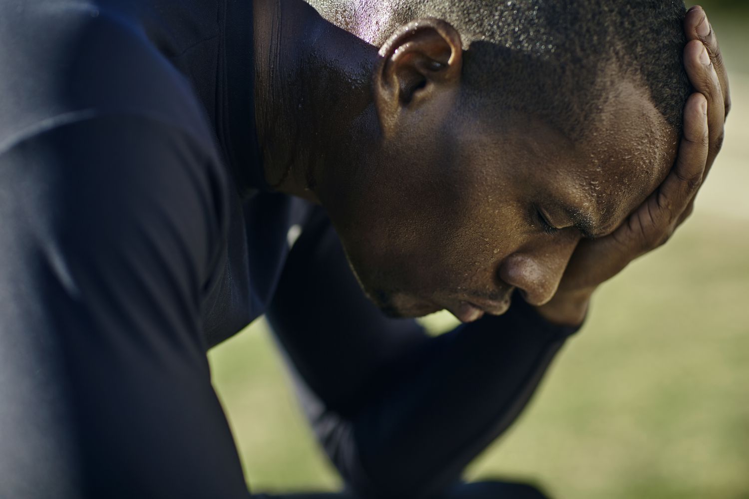 Athlete concentrating with his eyes closed