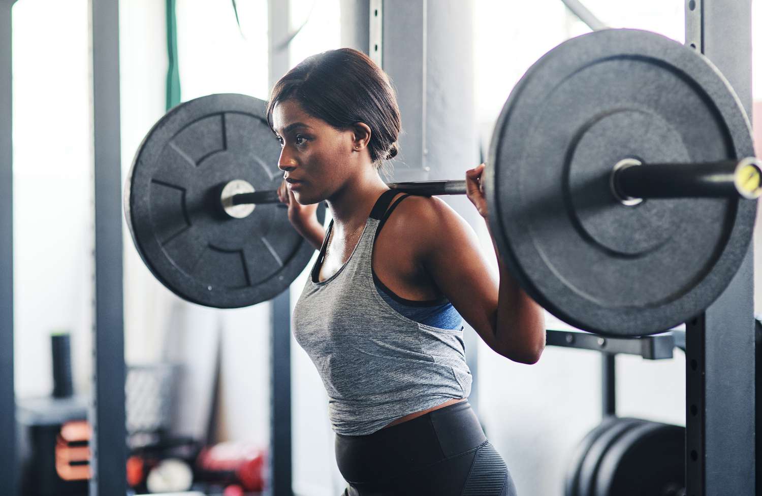 woman with barbell