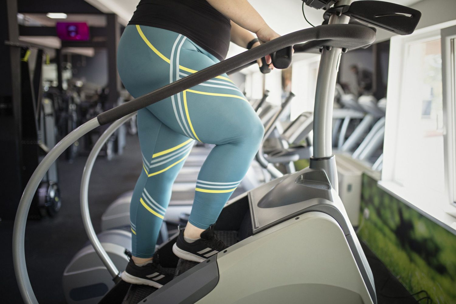woman working out on stairmaster stair-climber machine