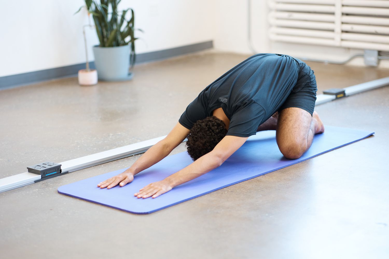 Person performing yoga on BalanceFrom GoYoga All-Purpose Yoga Mat