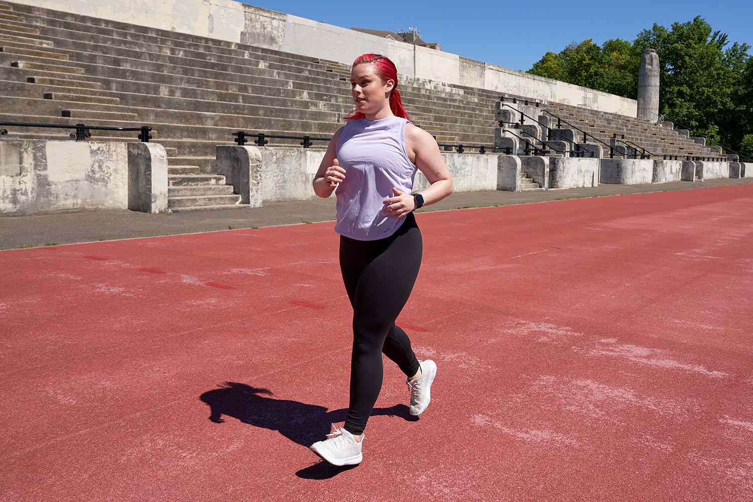woman doing a fitness test on a track