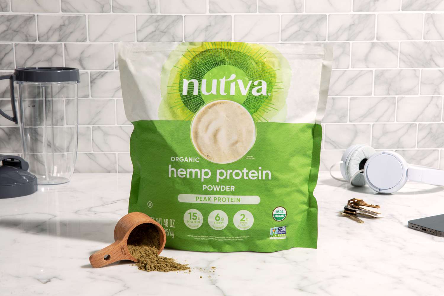 Nutiva Hemp Protein Powder On Marble Countertop