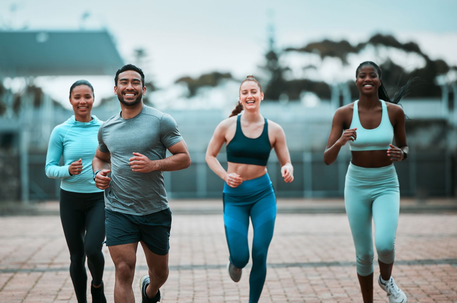 men and women running outdoors