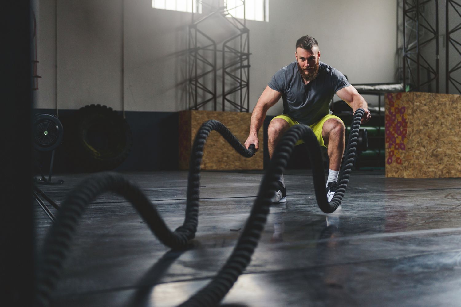 Man working out with battle ropes