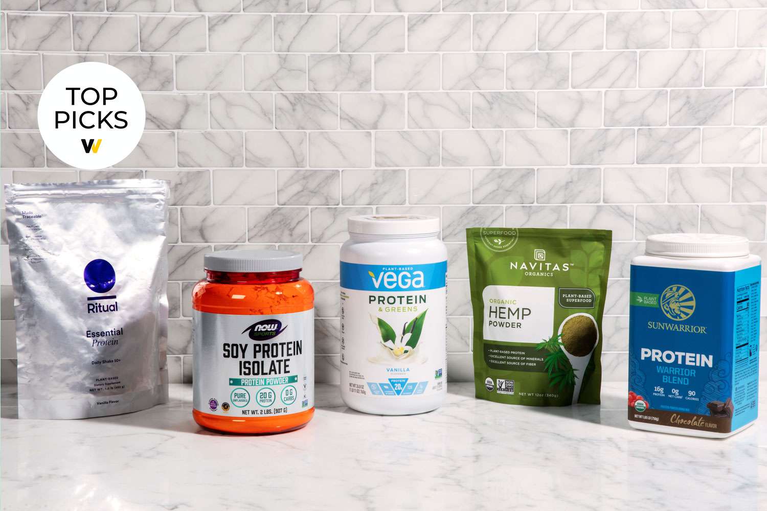 Best vegan protein powders displayed on marble counter