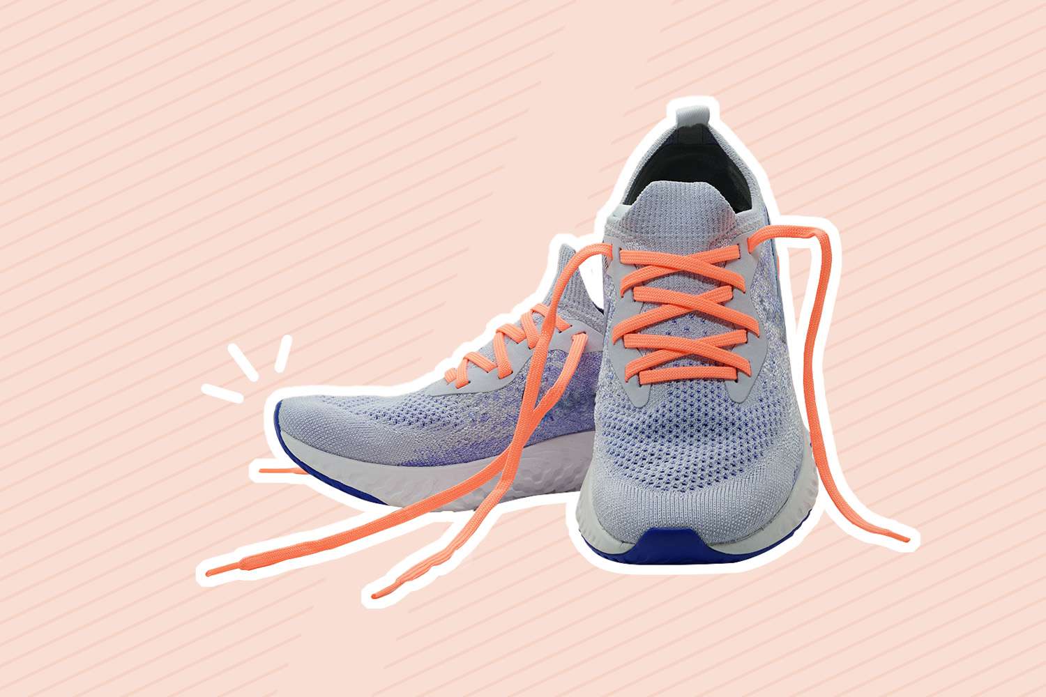 A pair of running shoes on an orange background
