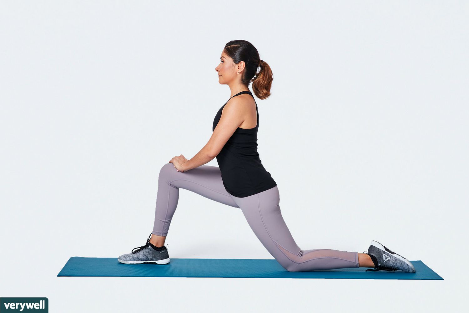 woman doing kneeling hip flexor stretch