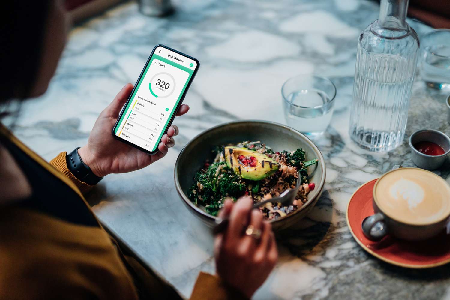 woman using a diet app to track food
