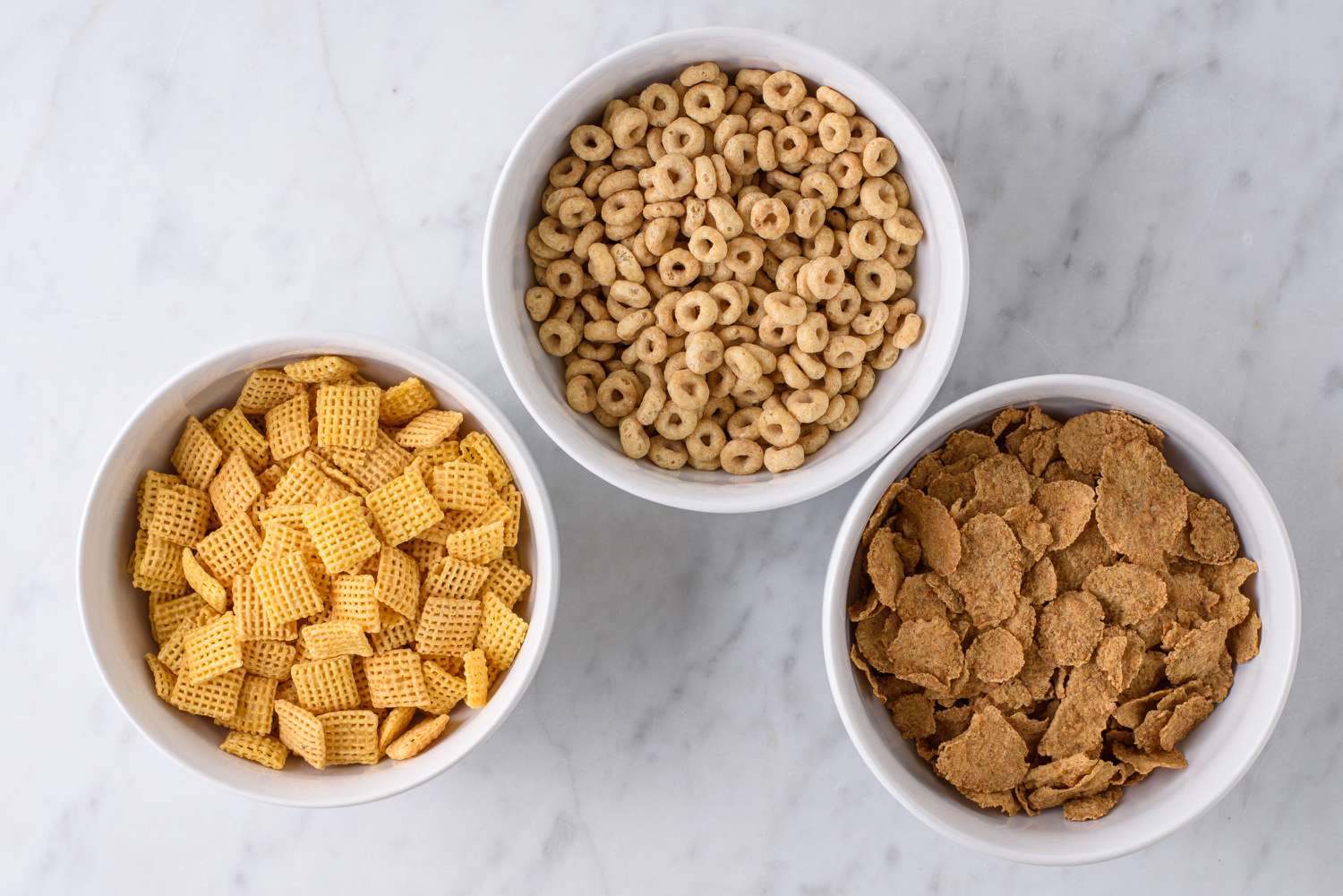 group of cereals in bowls