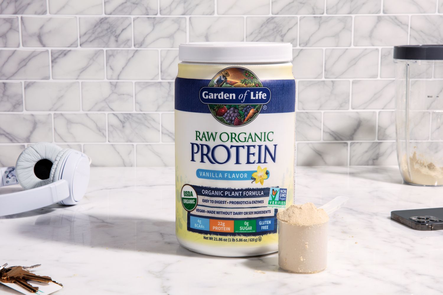 Garden of Life Raw Organic Vanilla Protein Powder displayed on a kitchen counter