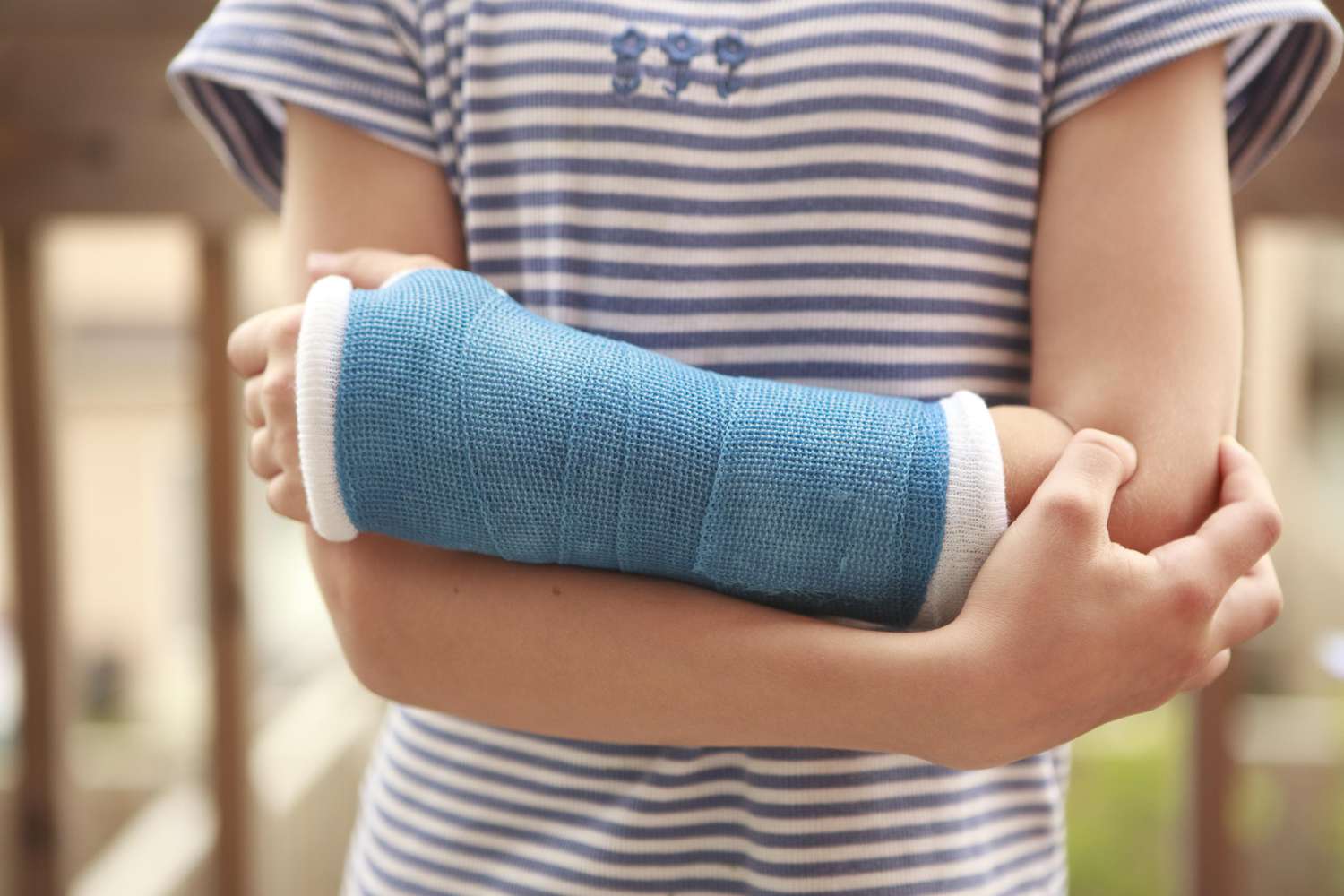 young girl's arm with cast